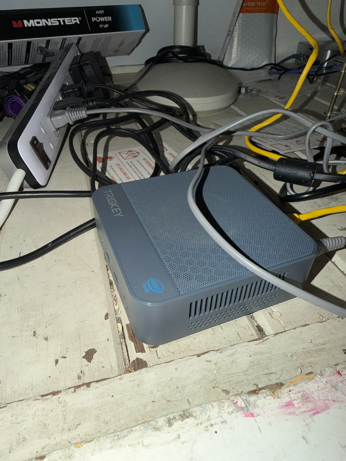 A TrigKey mini PC in an office closet